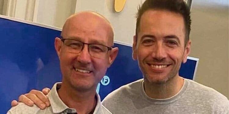 Mark Johnson receiving his award from Nick Dougherty