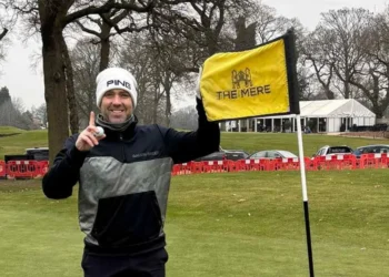 Jon poses after his grand slam ace.