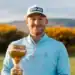 Jamie Van Wyk proudly displays the trophy after winning the Welsh Men’s Open Strokeplay Championship at Conwy.
