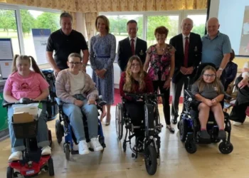 a group of people posing for a photo