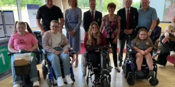 a group of people posing for a photo