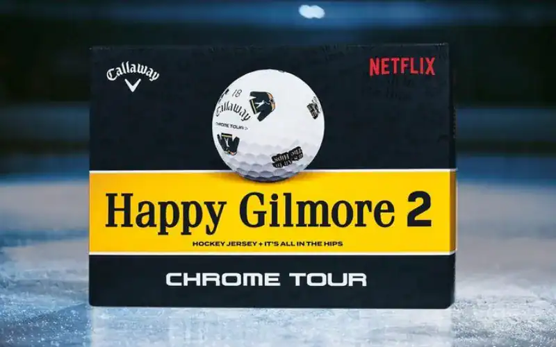 a gift box with a golf ball on it