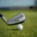 The new Titleist Expands T-Series with New T250•U and U•505 Utility Irons addressing a golf ball.