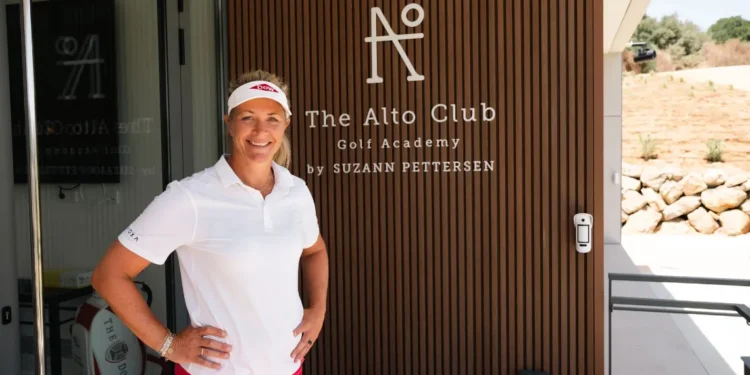 a woman standing in front of a door