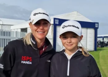 Alice Hall Wins Wales Golf Steps Challenge Two golfers posing in caps.