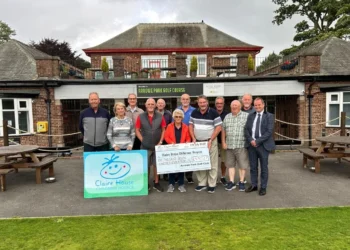 Group photo supporting children's hospice charity.