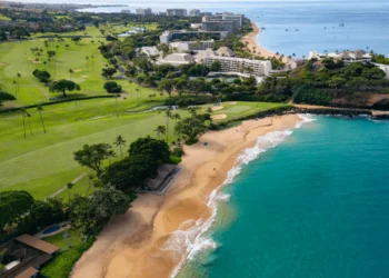 Kā'anapali Golf Courses Maui Open for Play Lush golf course beside stunning coastline.