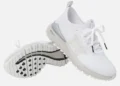 Stylish white golf shoes with traction.