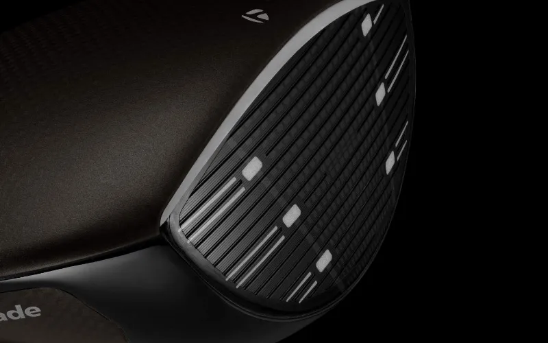 TaylorMade Qi4D face close-up reengineered roll radius consistent spin vertical impact.