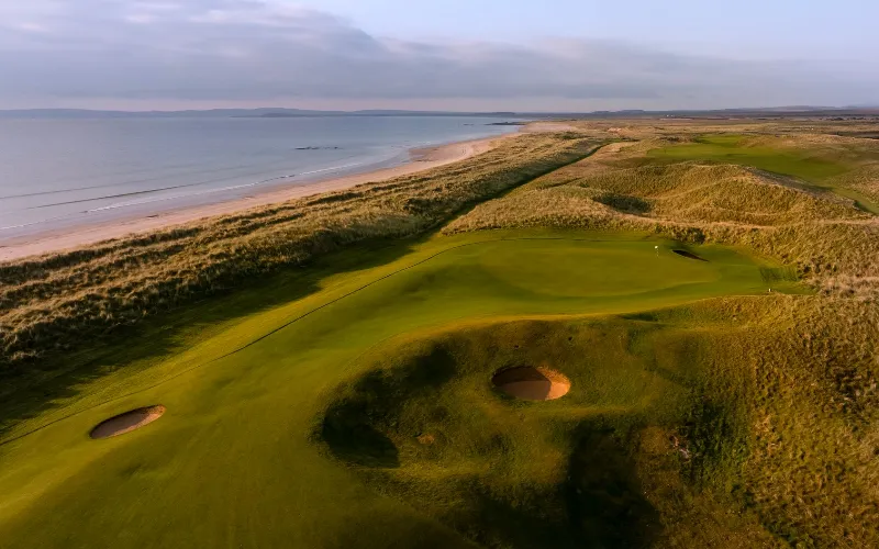 The 7,000-yard championship links at The Machrie with the Atlantic Ocean coastline in the background.
